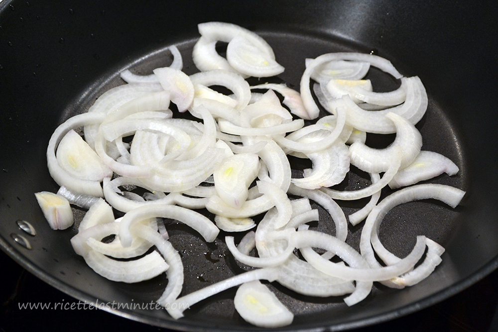 Onion finely chopped and put in a pan to brown