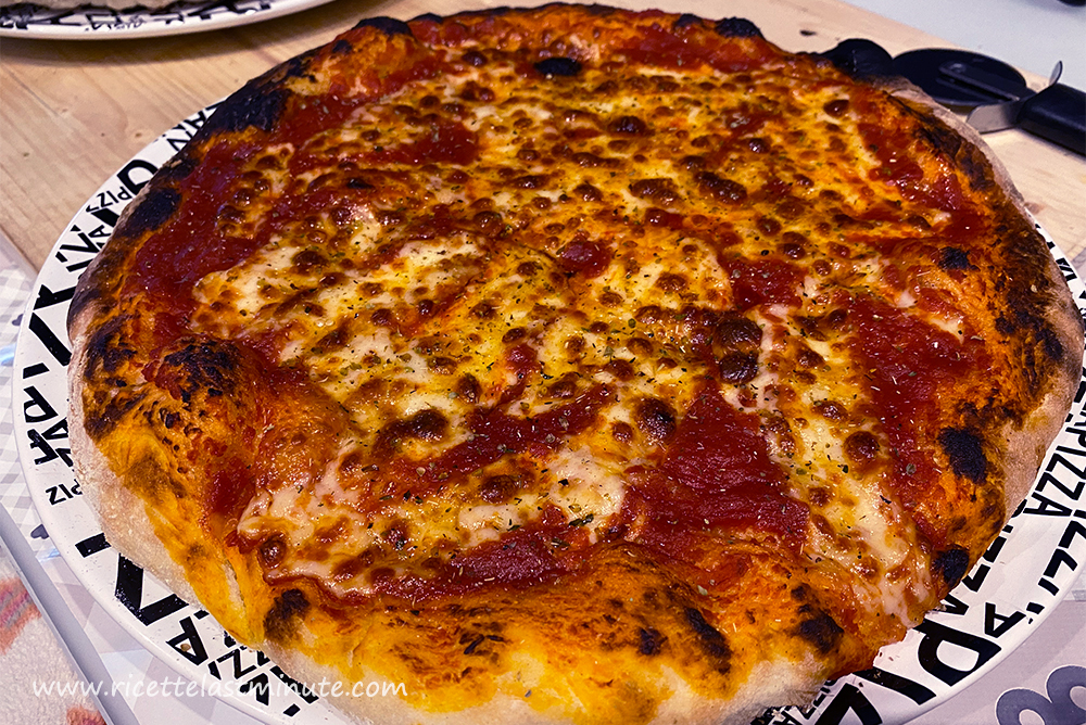 Well cooked pizza fresh from the oven
