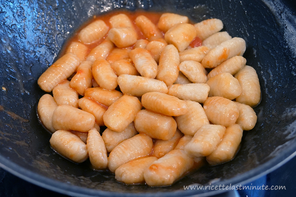 Spelled gnocchi dressed with tomato water