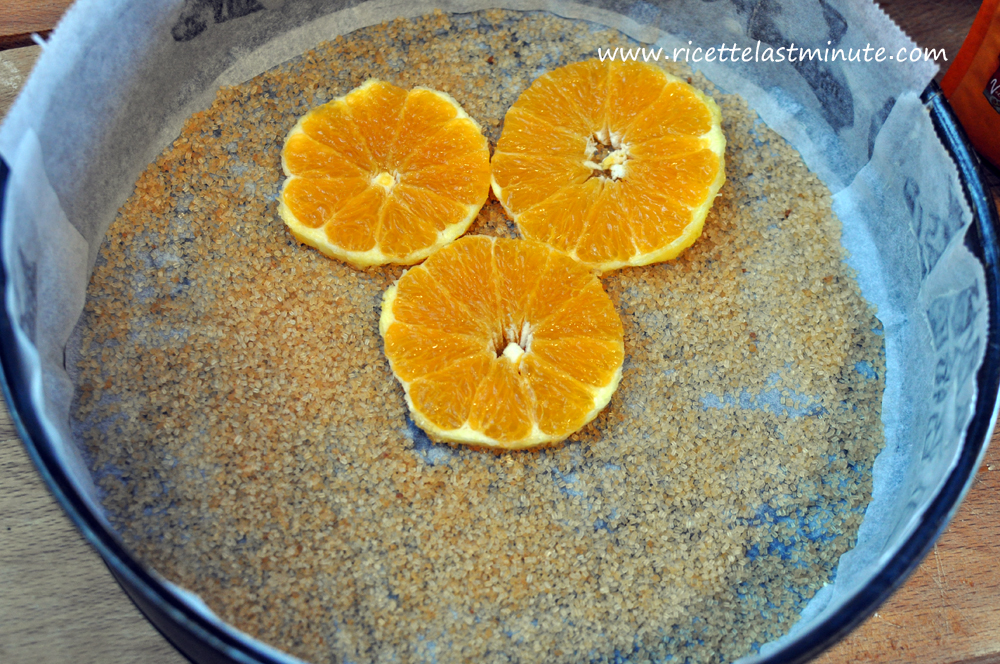 Oranges cut into slices and arranged in a pan