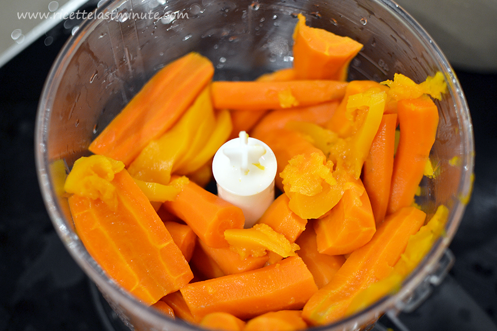 Steamed carrots and pumpkin in the mixer