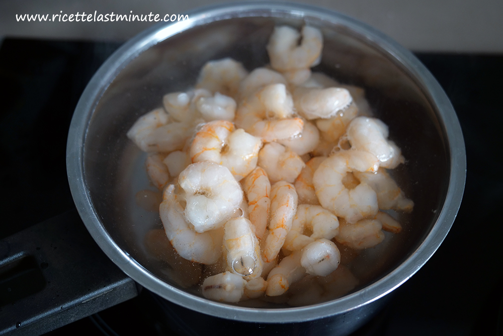 Frozen shrimps in a boiling water