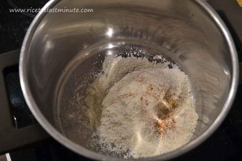 Pot with flour, salt and nutmeg for the bechamel sauce