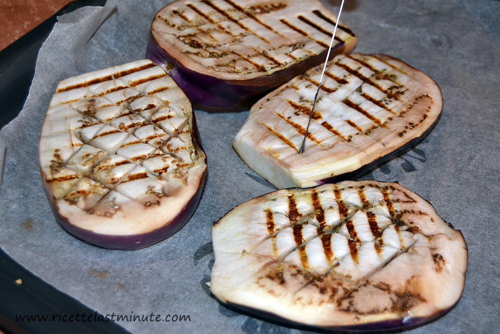 Cooked and carved eggplants