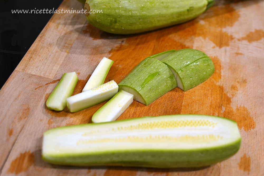 Courgettes washed, peeled and being prepared